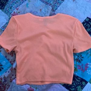 peach colored cropped top